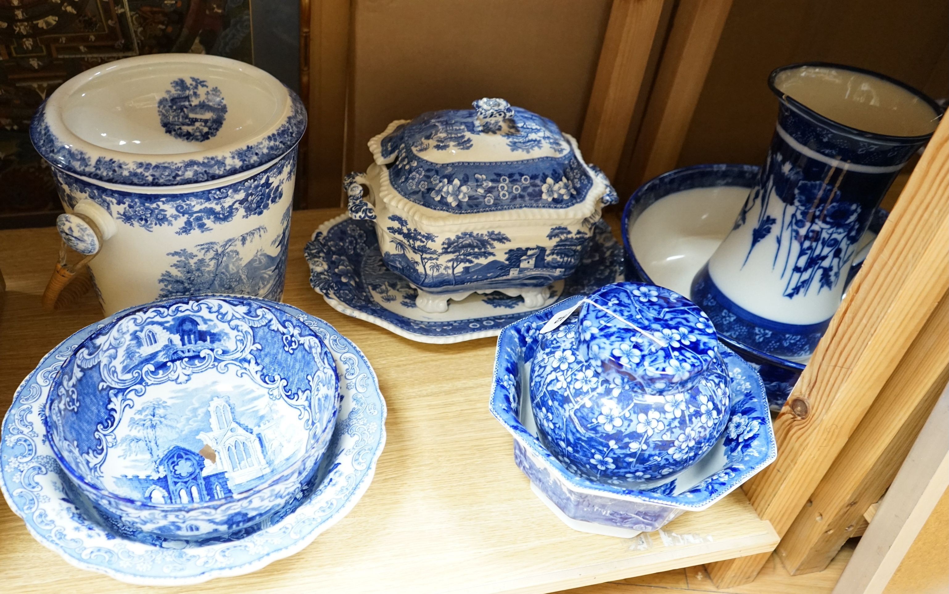 A blue and white jug and basin, tureen, cover and stand, slop pail, a jar and cover and three bowls